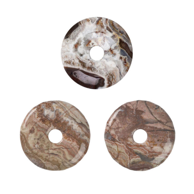 Drei verschiedene Lace-Achat Donuts mit 40 mm Durchmesser