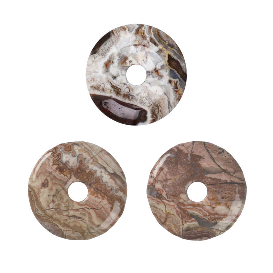 Drei verschiedene Lace-Achat Donuts mit 40 mm Durchmesser